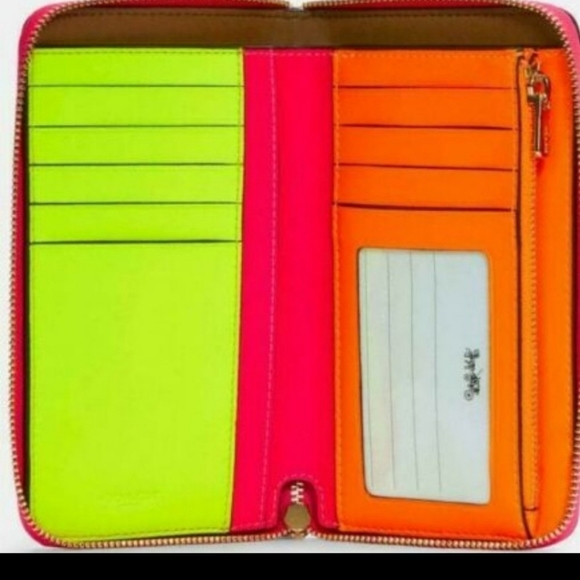 Looking for this Coach Wallet in Neon Pink - Picture 1 of 2